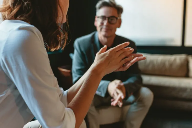 two people discussing the difference between inheritance advance and probate loan 